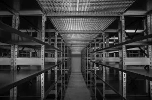 Metal shelves in a large warehouse.