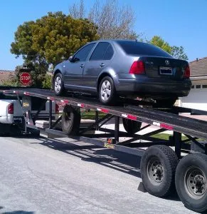 Car on the car carrier - The most common way of car shipping HK