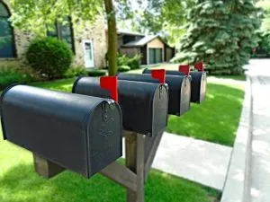 Four black mailboxes