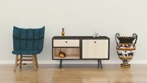 A chair, an end table and a vase for furniture movers Hong Kong to relocate.