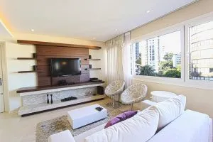A beige living room in an apartment.