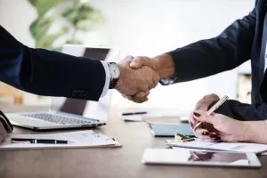 Men shaking hands.