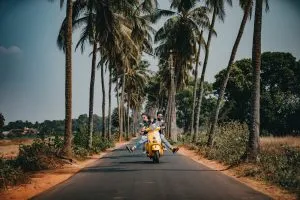 a couple on a scooter