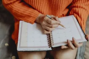 A woman holding her agenda