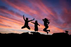 people jumping and enjoying Top summer activities in Hong Kong