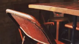 A wooden chair and table.