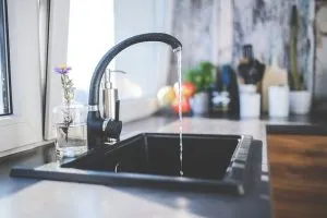 A faucet with running water.