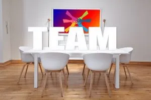 an office table with chairs