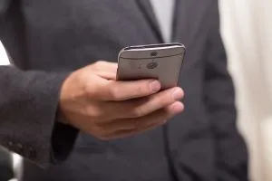 a man holding a cell phone
