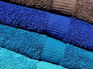 Using towels - one of the eco-friendly ways to use packing supplies.