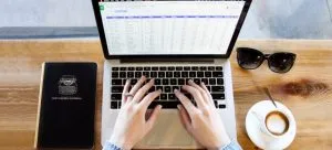 a person making a plan on the computer