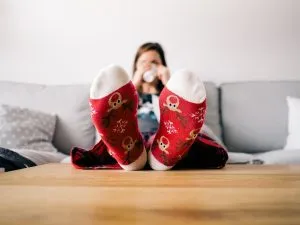 a girl sitting on a couch