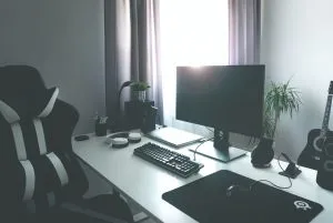 A desk with a PC