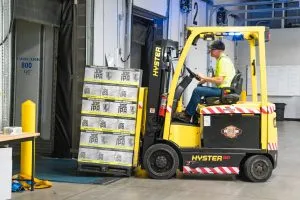 A worker inside a warehouse
