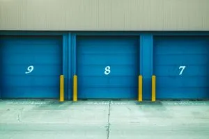 storage units with blue doors and numbers 9, 8, and 7 on them
