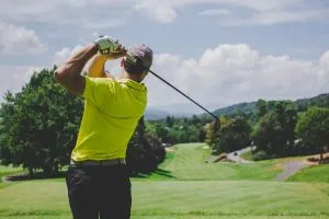 A man golfing