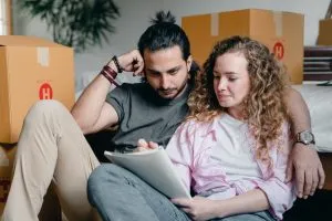 a couple creating a moving checklist