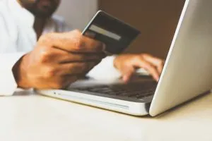 person holding a credit card