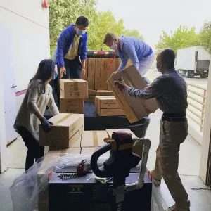 people carrying boxes