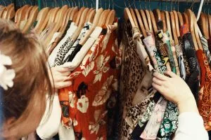 person looking at clothes