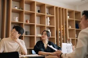 people on a meeting talking about the best time to move a business