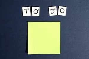 Yellow sticky notes and “to do” sign
