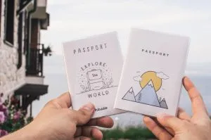 people holding passports