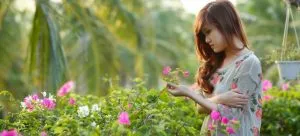 A girl in a garden - moving your garden in a new home