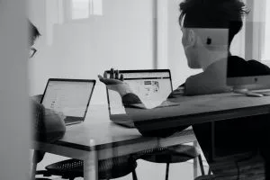 person planning an international move on their laptop