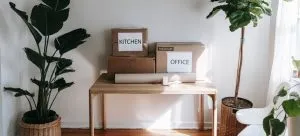 labeled moving boxes on the table