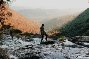 man standing on the rock