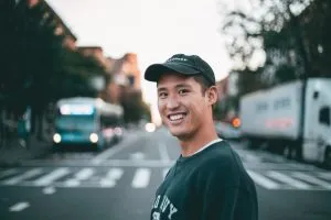 a man standing on the street - organizing an international move with a toddler
