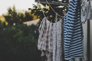 wash your clothes before packing summer clothes for moving