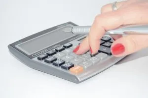 woman using a calculator