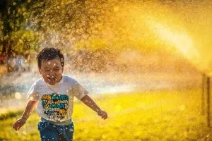 make moving easier on kids by playing in the rain
