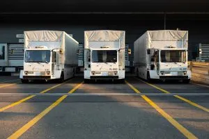 three moving trucks