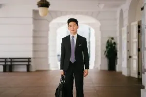 a man in suit - move abroad with a toddler