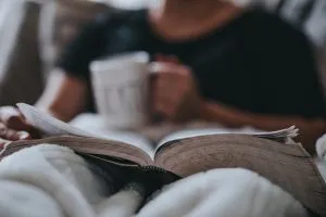 a man relaxing with a book