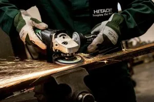 person holding power tool