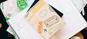 visa and some papers on a desk for better visualization of job opportunities to expect after moving from HK to Australia