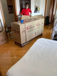 ReloSmart mover packing the boxes