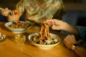 Two people eating in the restaurant