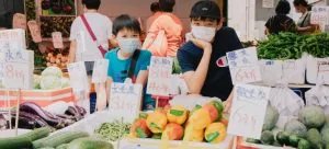 2 boys on a market