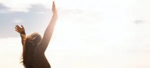 Woman is relaxed because she succeeded in reducing the costs of relocating internationally