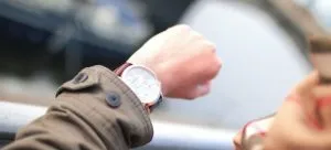 Person looking at the time when relocating on short notice