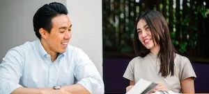 A couple speaking and laughing