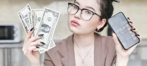 Woman calcualtaing her living expences