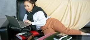 Picture of a woman browsing on the couch