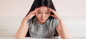 A woman having a headache