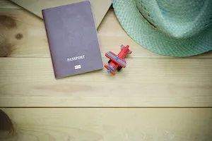 A passport and a toy plane